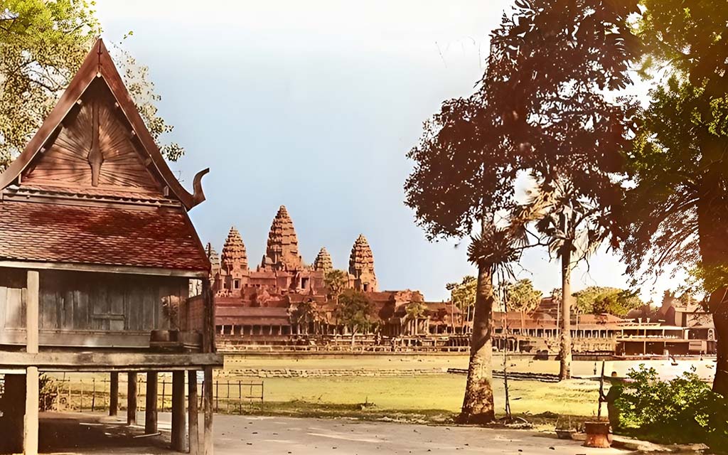 The photo credits go to Wikipedia and it shows a traditional Khmer house located in front of the Angkor Wat Temple, captured sometime between 1919 and 1926.